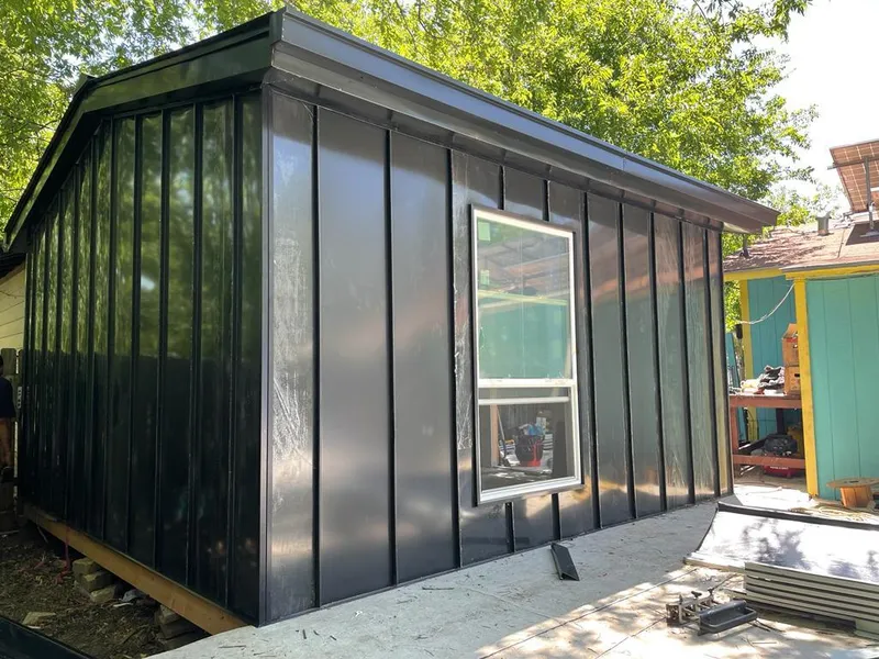 Black standing seam metal wall panels for Metal Roof Installation in Belterra