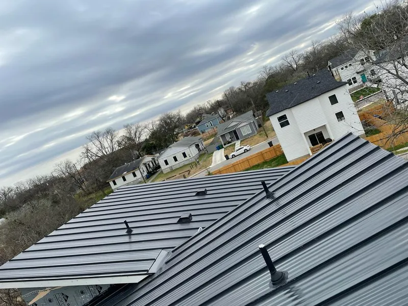 Standing seam metal roof panels with vents for Skylight Repair in Belterra